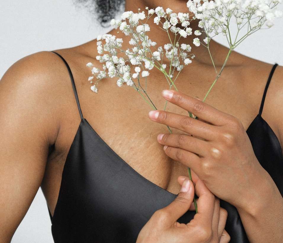 women holding baby's breath flowers