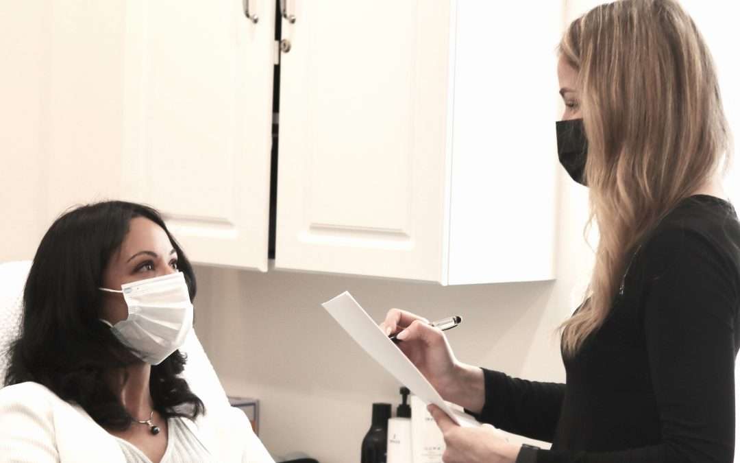 client and esthetician consultation at Total Wrapture Medi Spa