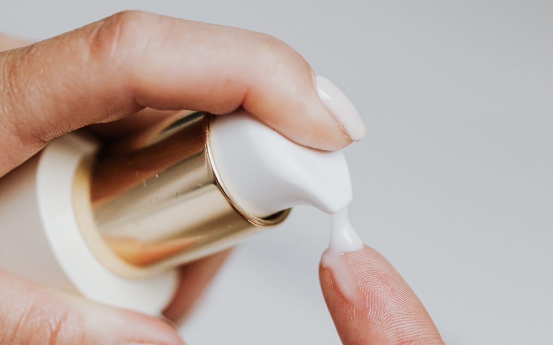 pumping skincare onto finger