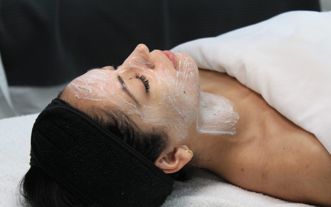 client getting a facial service