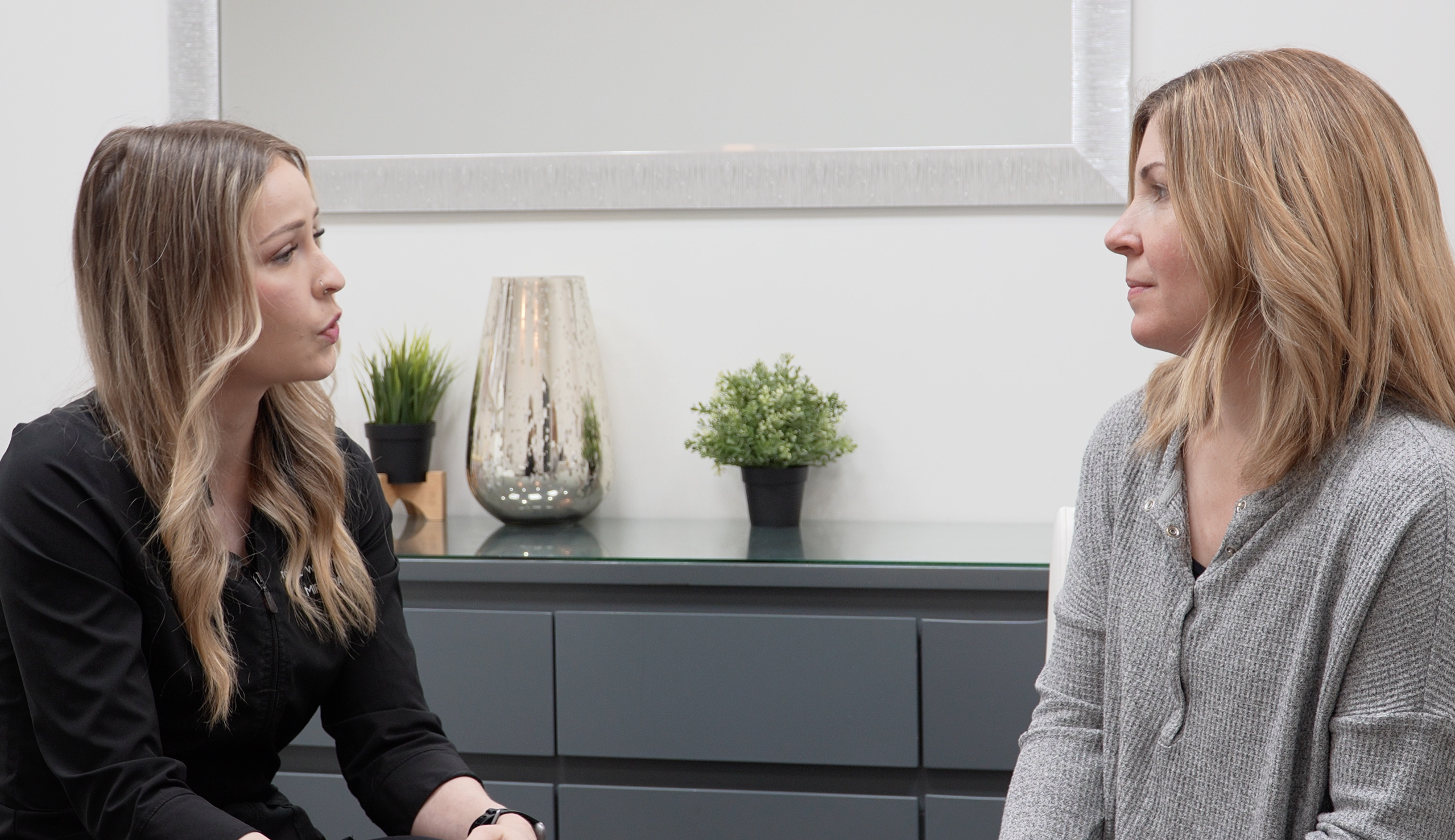 "laser technician discussing microblading removal"