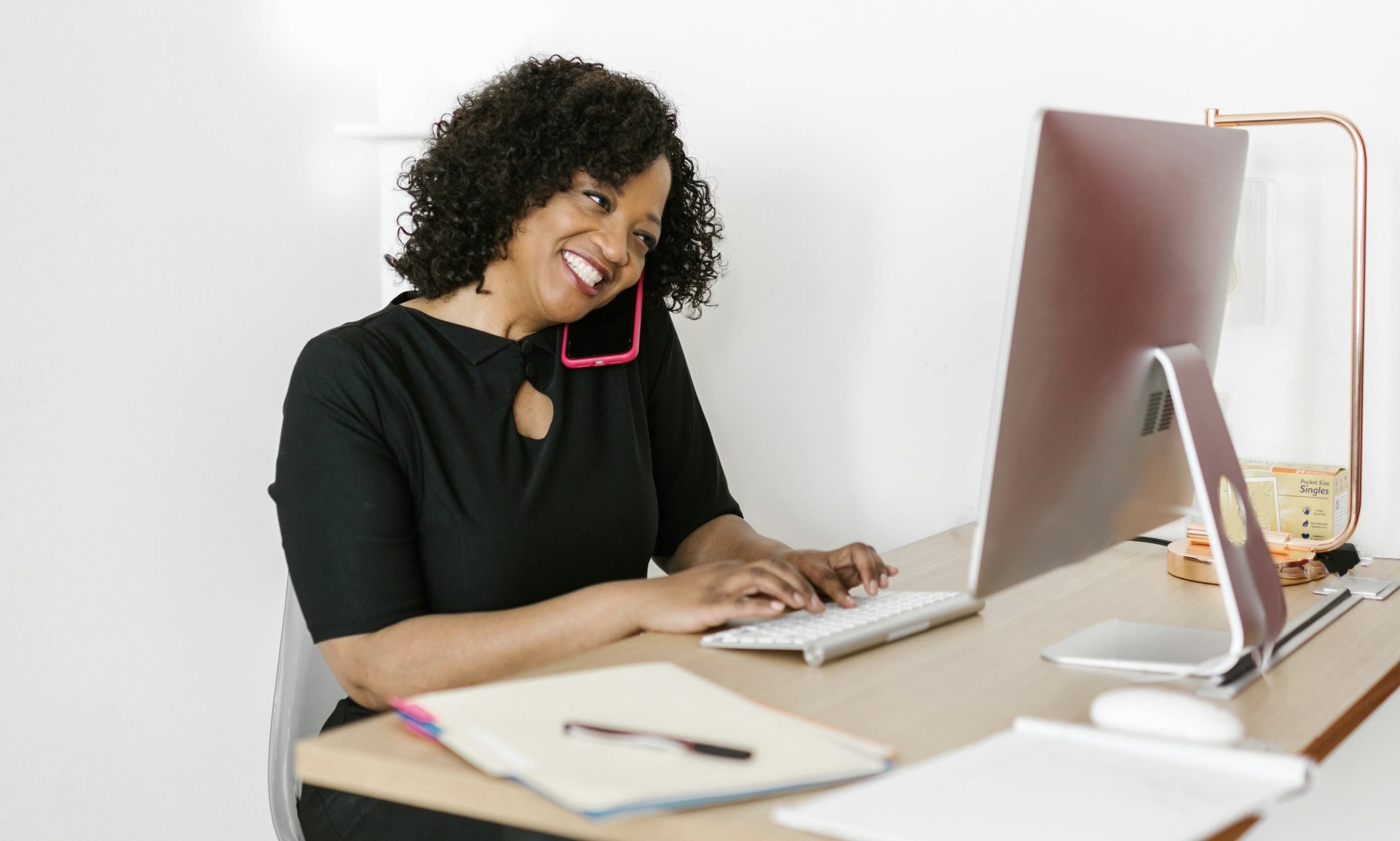 A busy woman who knows the value of semi-permanent beauty services to save her time during her morning routine