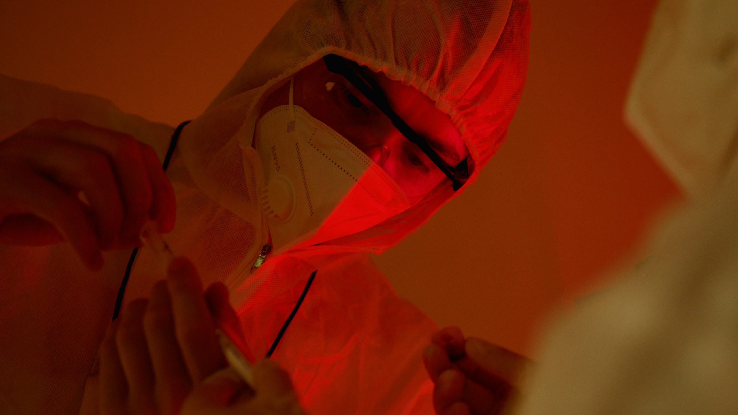 scientist testing red light therapy