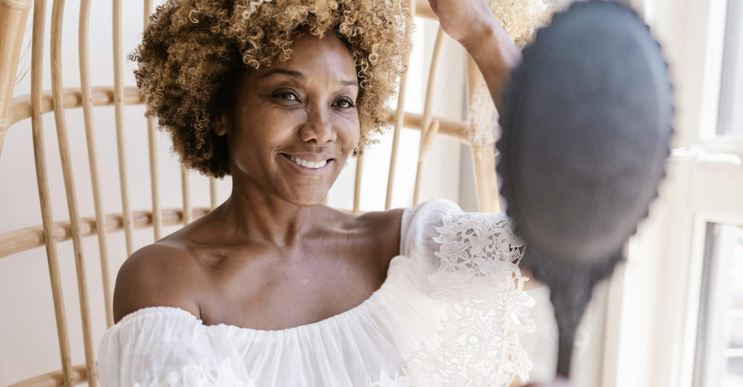Woman looking into a mirror