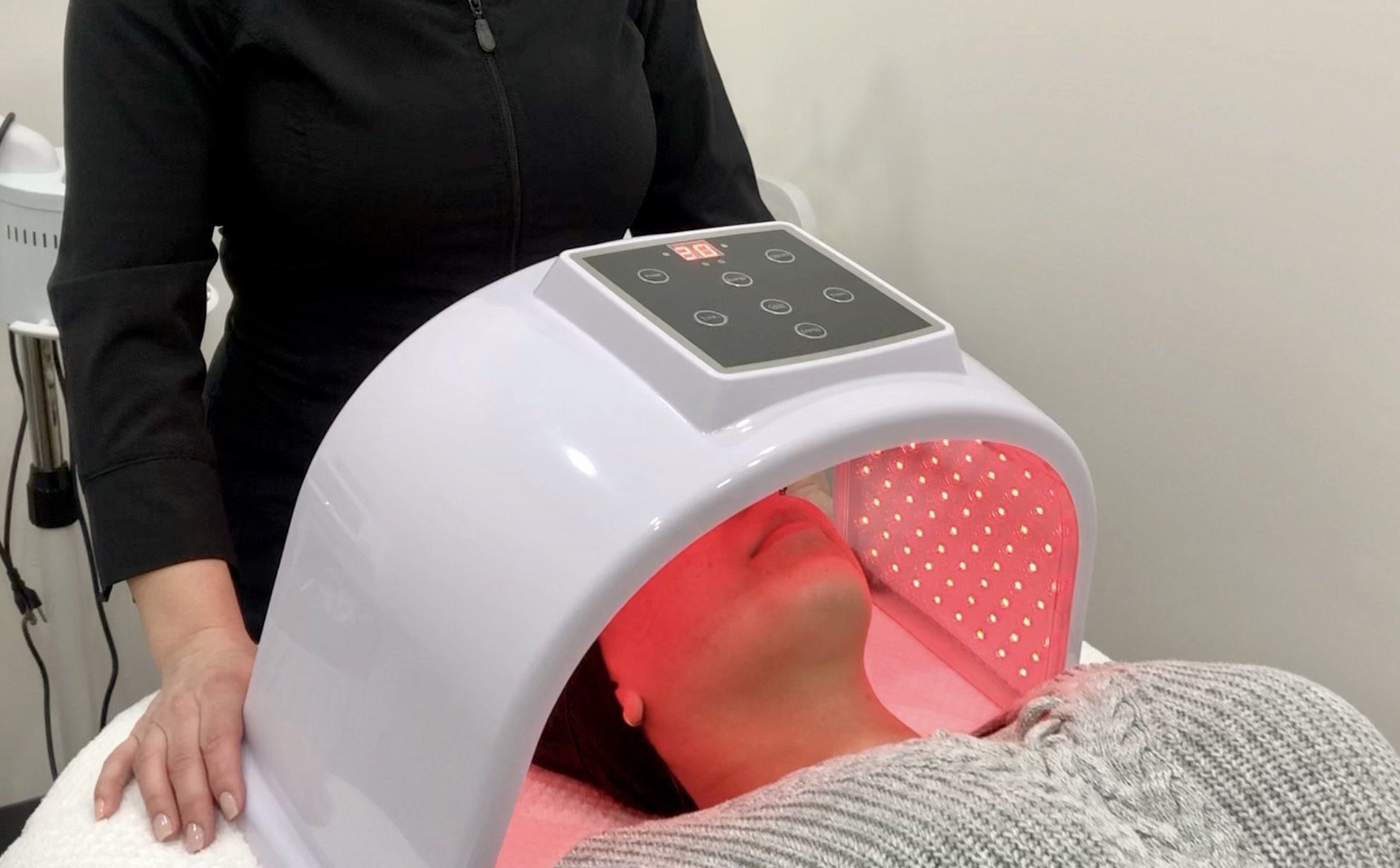 a person receiving red light therapy in winnipeg for anti-aging 