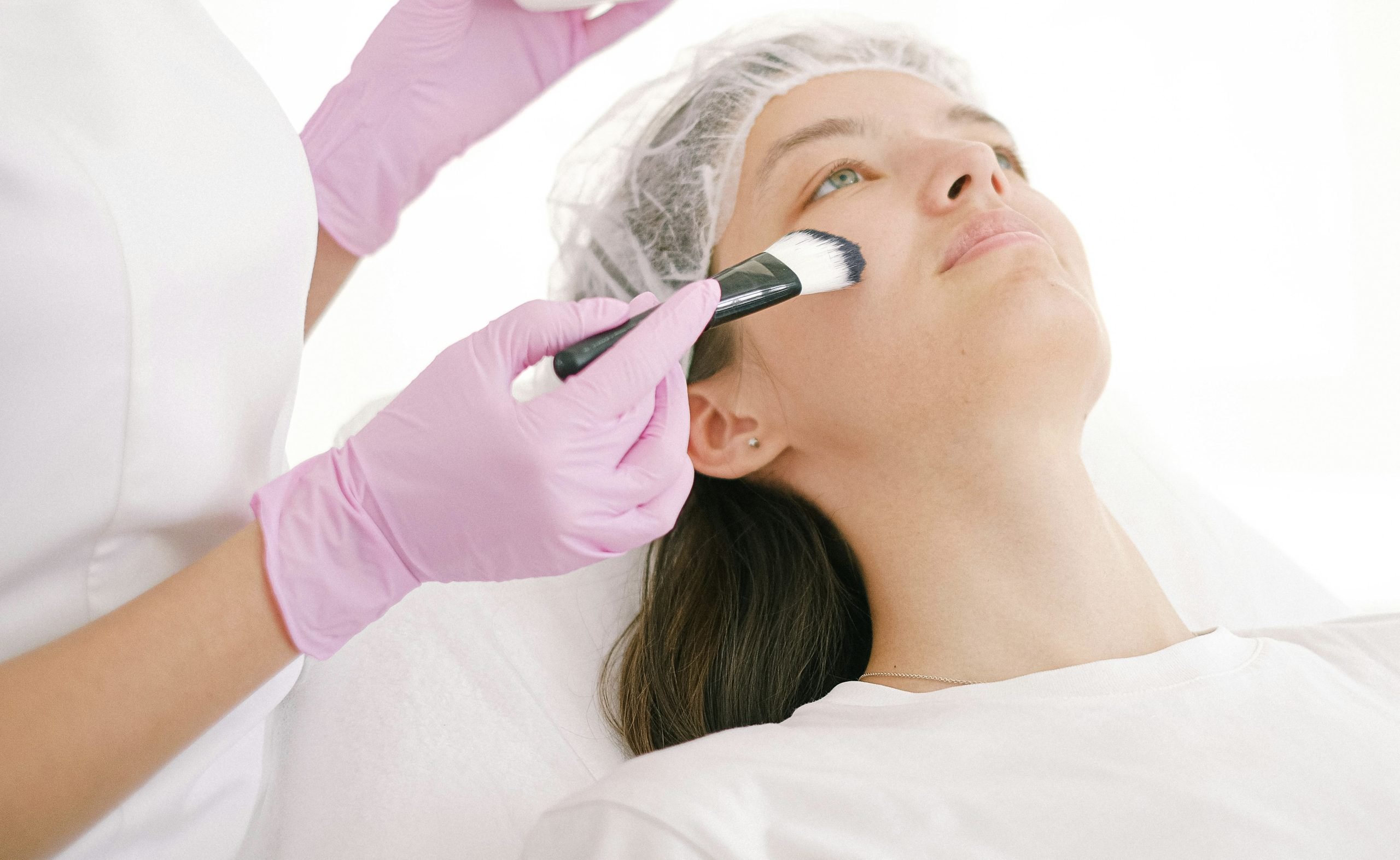 woman receiving a facial or chemical peel